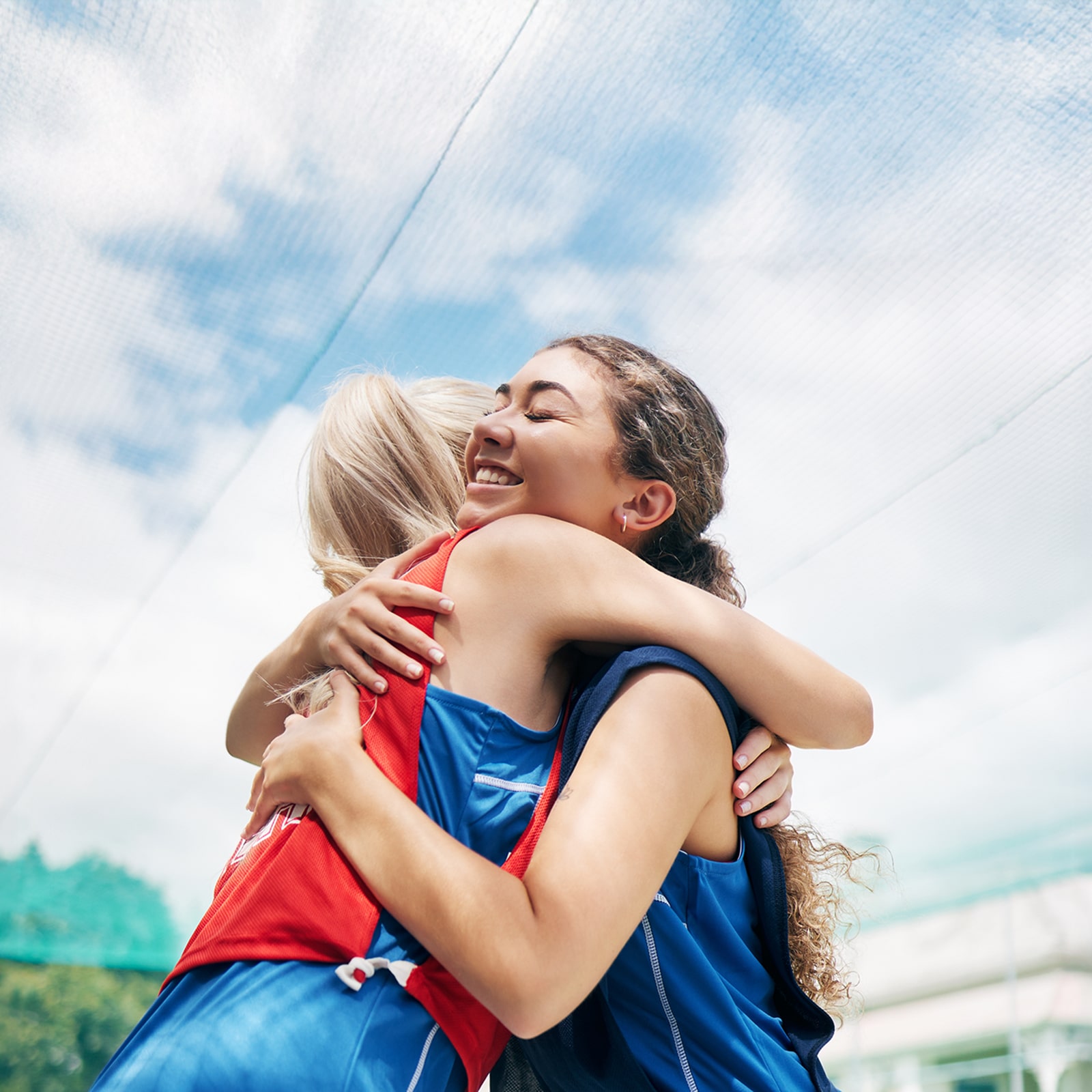 two individuals hugging each other