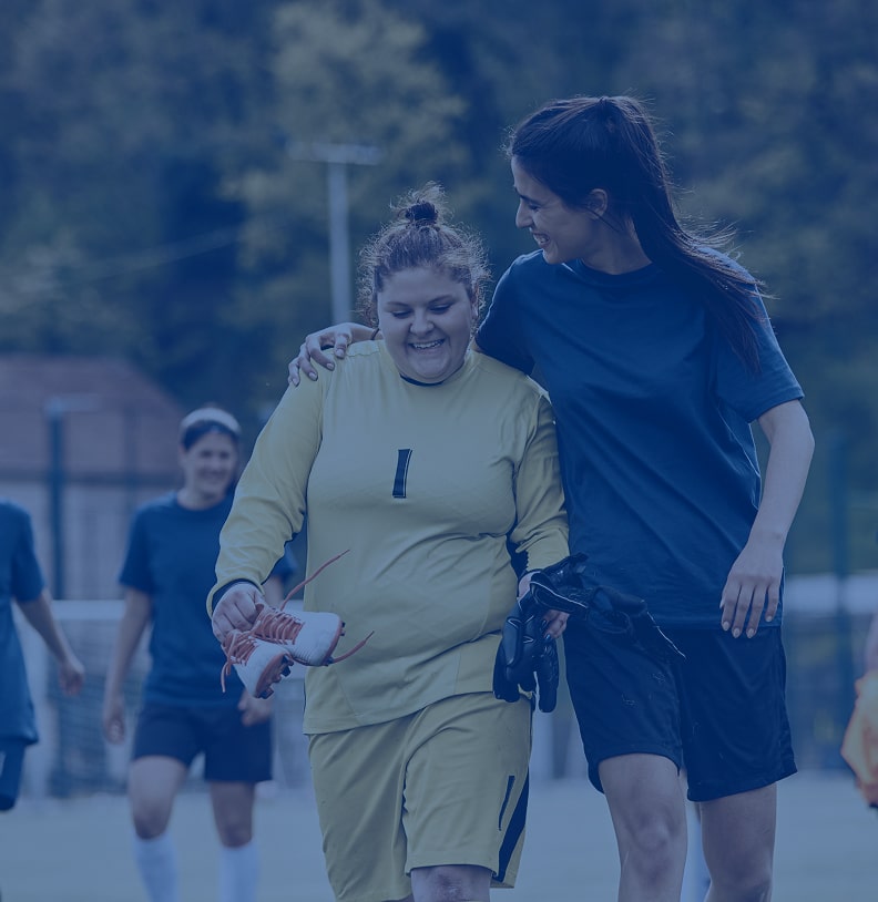 Coach supporting athlete